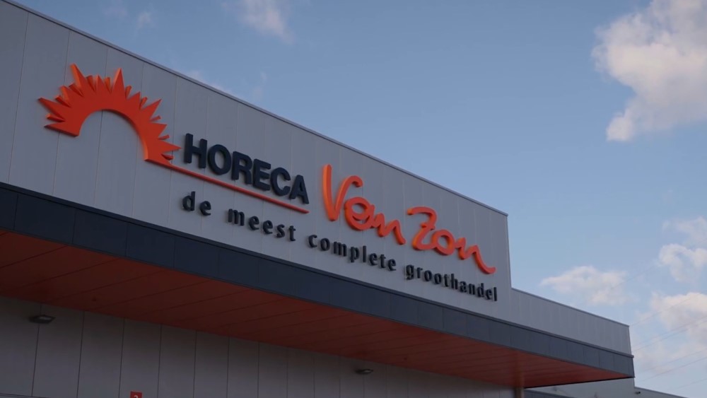 Logo of horeca van zon on front facade of warehouse