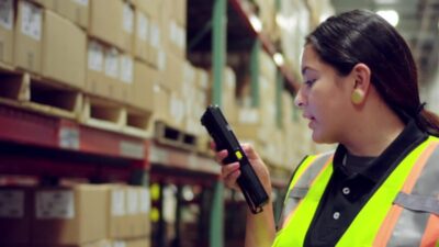 Warehouse worker using workforce connect to talk with manager