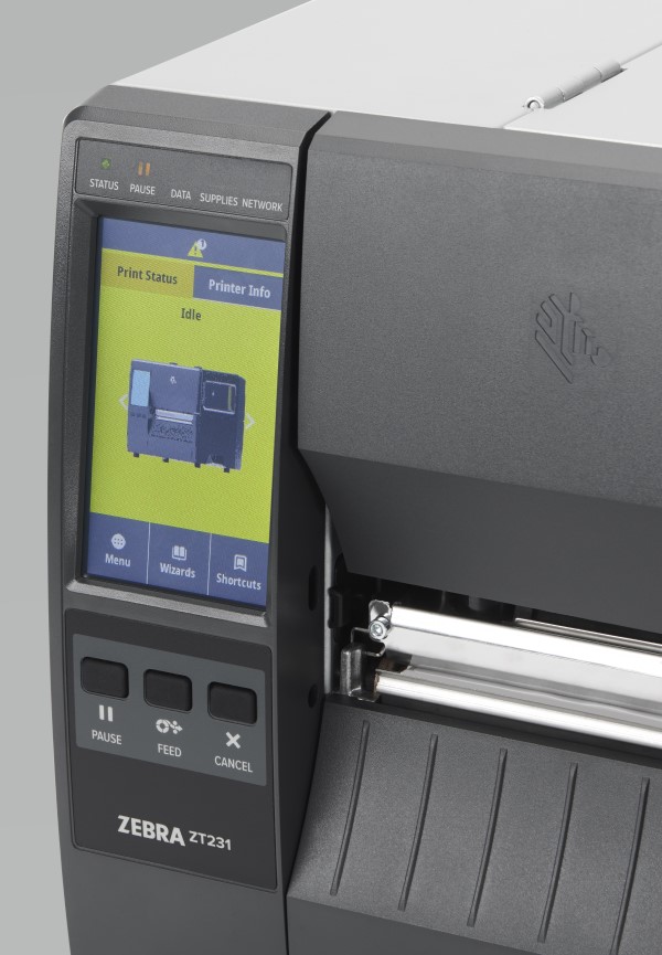 Zebra ZT231 printer with display showing print pause